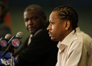 There's a reason Joe Dumars (background) looks uneasy whilst introducing Allen Iverson. Especially after trading away Chauncey Billups to get him.